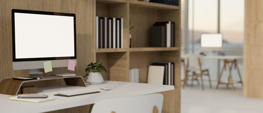 side view, Minimal and comfortable office workspace with computer mockup, wooden shelves